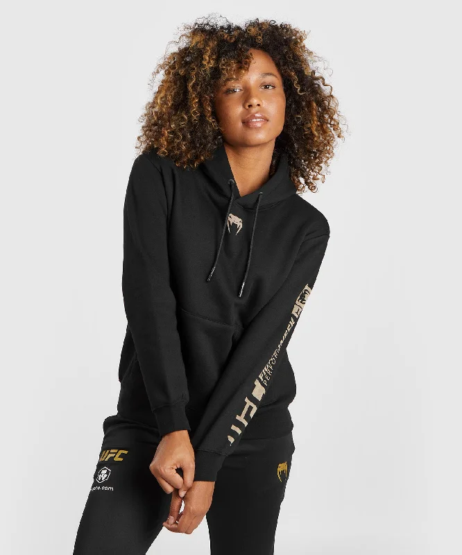 Sweatshirt à capuche pour Femmes UFC Adrenaline by Venum Fight Week - Noir Iron Safe Non-Iron Wrinkle Free Sweatshirt à capuche pour Femmes UFC Adrenaline by Venum Fight Week - Noir Iron Safe Non-Iron Wrinkle Free