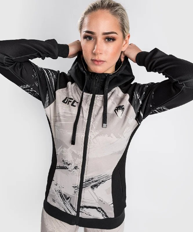 Sweatshirt Zippé pour Femmes UFC Venum Authentic Fight Week 2.0 - Noir/Sable